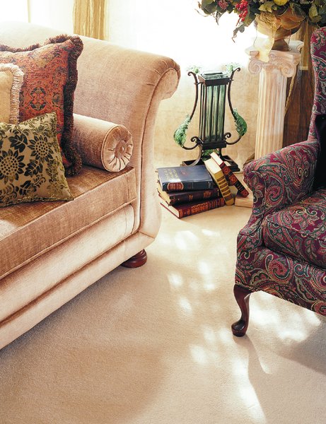 UPHOLS3 Luxurious upholstered furniture and armchair after professional upholstery and sofa cleaning by Eco Valley Chem-Dry in Calgary living room.