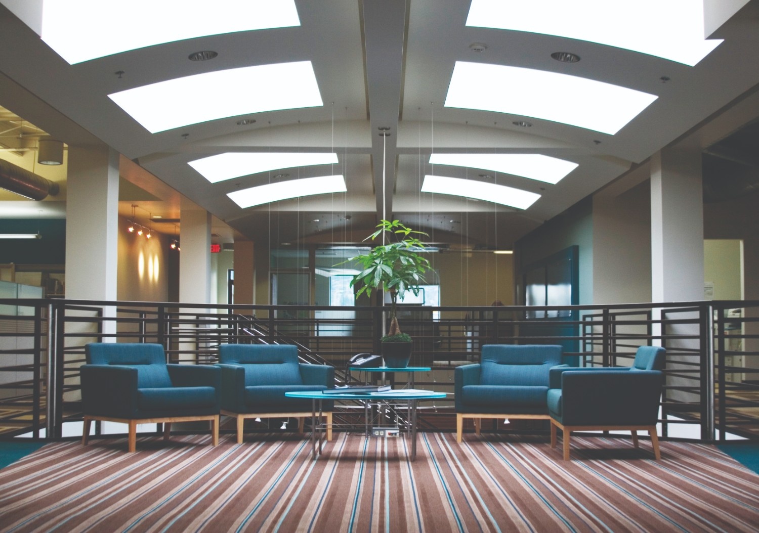 u5 Modern office lounge with freshly cleaned upholstered furniture after professional upholstery cleaning and deodorizing by Eco Valley Chem-Dry in Calgary.