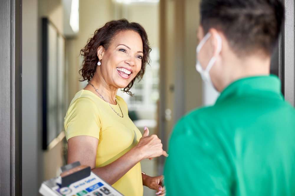 Eco Valley Chem-Dry technician arriving for carpet cleaning service at home in Okotoks