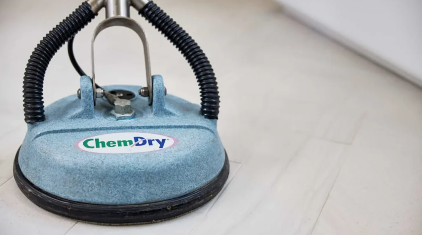 Upholstery cleaning machine used on hardwood floors for deep cleaning and stain removal