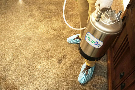 445px-sanitizing-3 Professional Chem-Dry equipment being used to clean a residential carpet