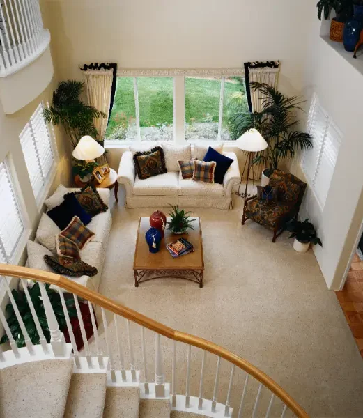LivingRoomcleainigservices lean carpet in a bright living room after professional treatment to help kill fleas and remove debris.
