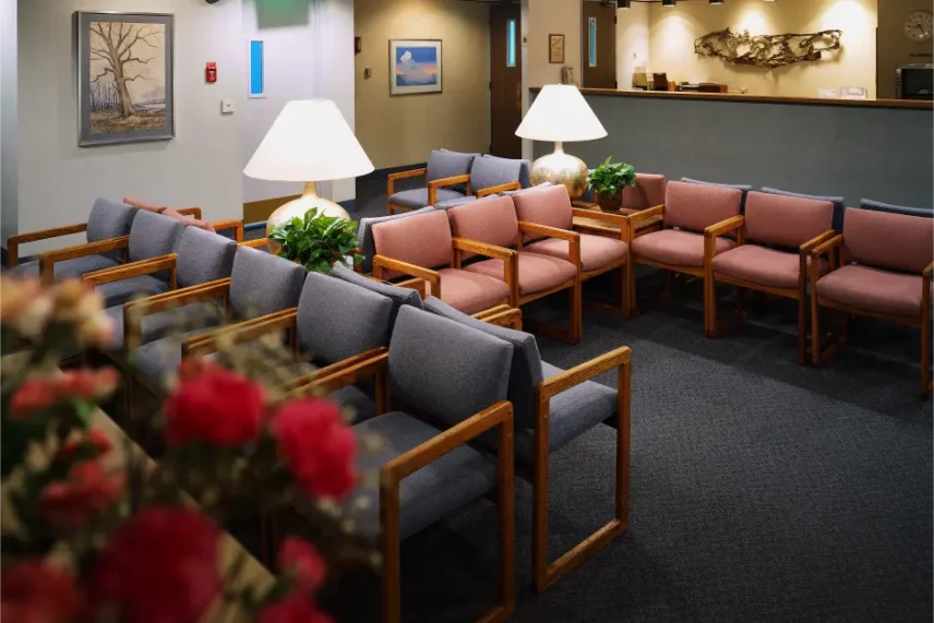 Waiting area with rows of upholstered chairs in a commercial office or clinic space, representing professionally maintained upholstery suitable for commercial carpet and furniture cleaning services