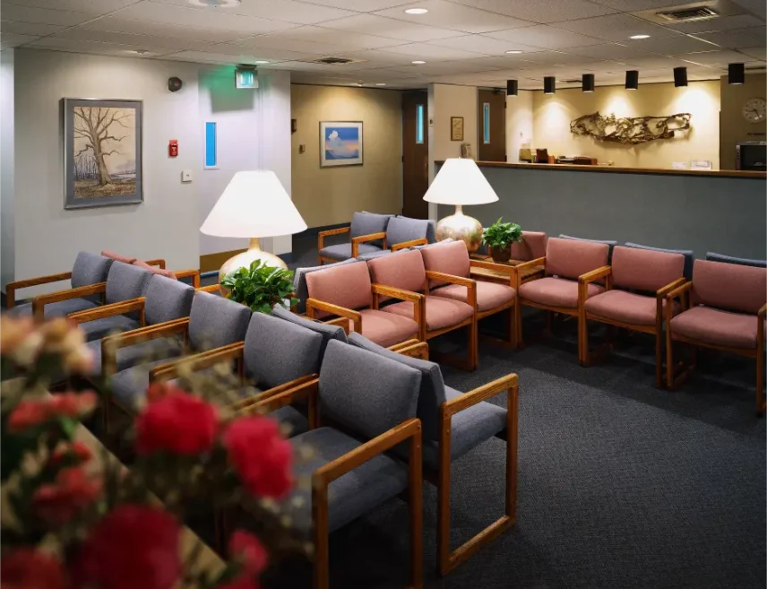 Clean and well-maintained upholstered chairs in a professional waiting room after commercial upholstery cleaning service