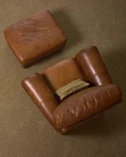 Leather armchair and ottoman after professional sofa and carpet care by cleaning services Cochrane