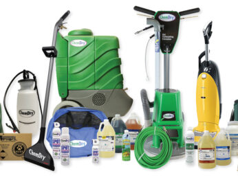 Professional upholstery and carpet cleaning equipment set including extraction machines, hoses, and cleaning solutions
