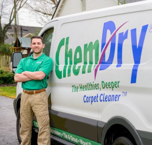 Eco Valley Chem-Dry carpet cleaning technician standing beside service van in Okotoks